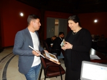 Dr Noorah Al Gailani gifting books to the Basrah Museum Library on Day 5
